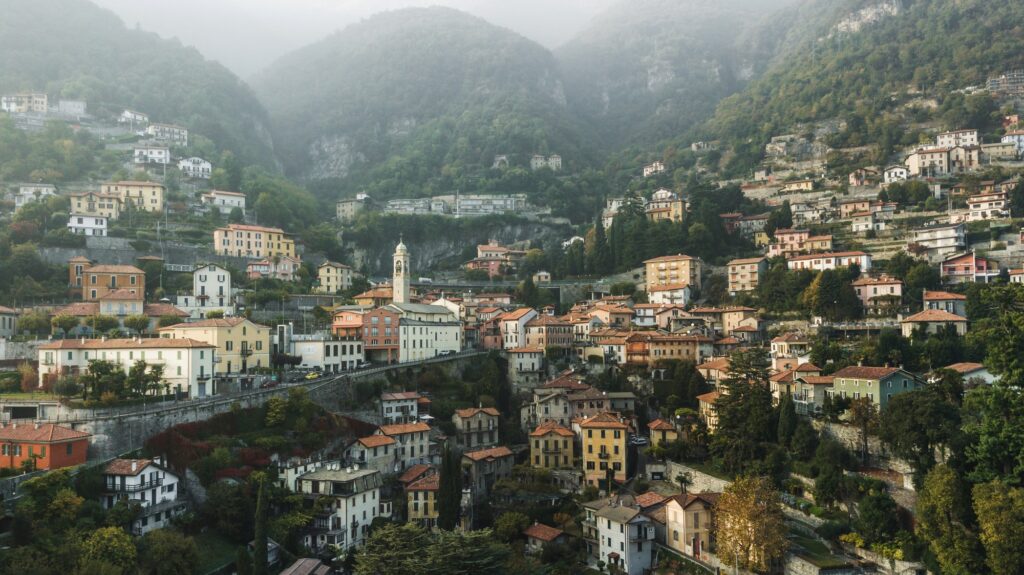 Aerial panoramic drone view of Moltrasio town on Lago di Como lake, Italy